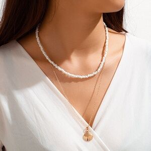 **APOLLONIA* Gold x White Shell Fashion Necklace